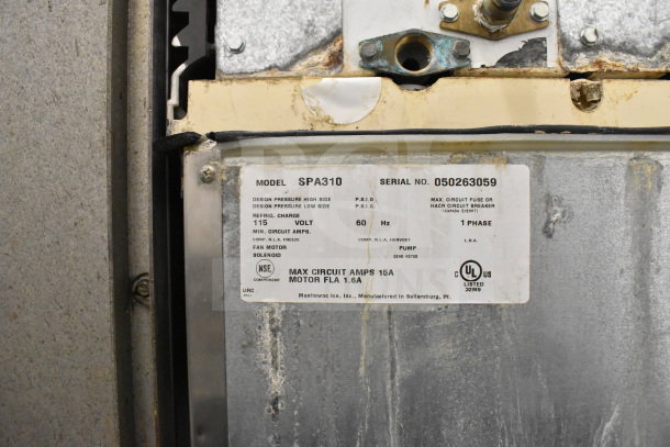 Manitowoc SD0452A ice head on SPA310 dispenser, 115V, 1 phase. Label shows model, serial number, and electrical specs.