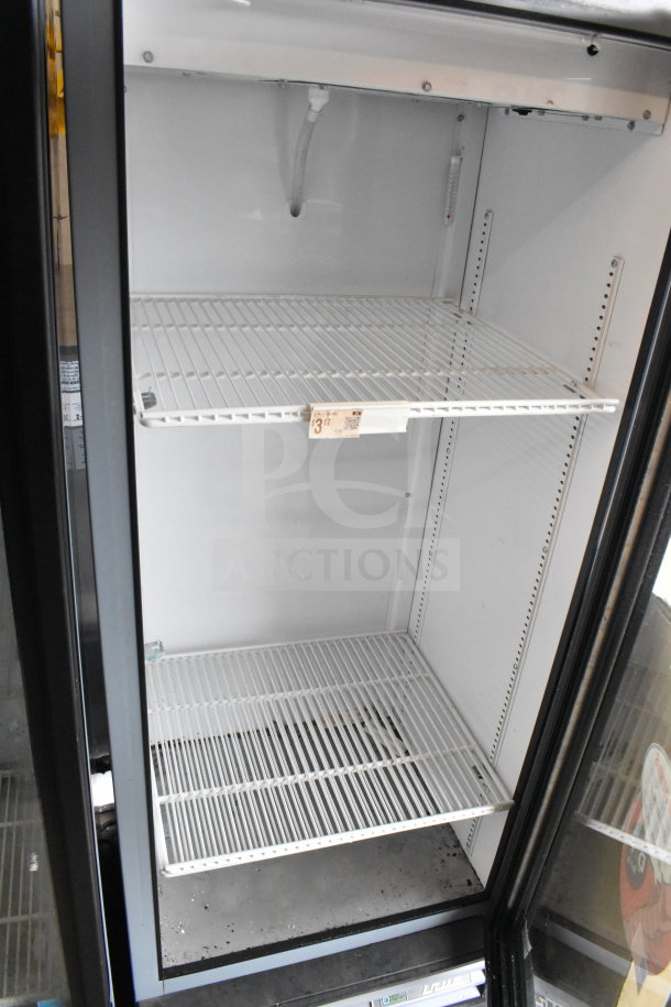 2017 True GDM-12-HC-LD commercial cooler, single door, clean interior, white shelves, 115V, 1 phase, brand plate visible.