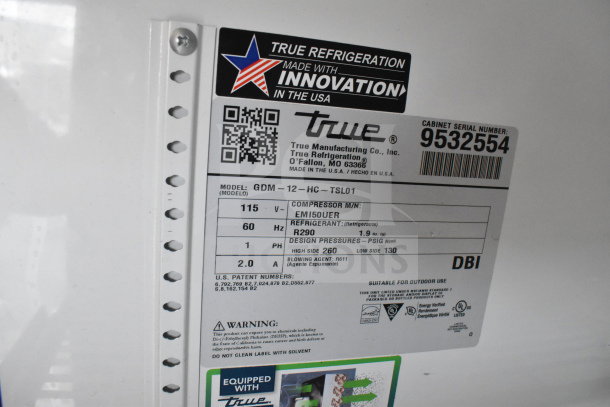 Label for 2020 True GDM-12-HC commercial cooler, showing model, voltage (115V), single phase, and refrigerant details.
