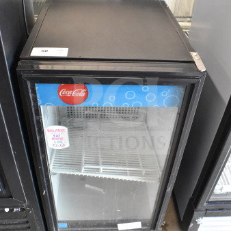 True GDM-06-LD Mini Cooler Merchandiser, commercial single door, black frame, Coca-Cola branding, 115V, used condition.