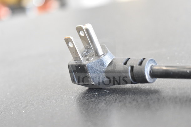 Close-up of a power plug from an Imbera VRD41 Commercial Reach-In Cooler, 115 Volts, 1 Phase.