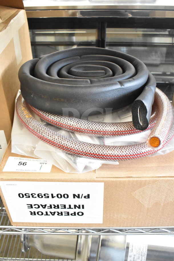 BRAND NEW SCRATCH AND DENT Operator Interface, model P/N 00159350, coiled cables, visible box label, auction item.