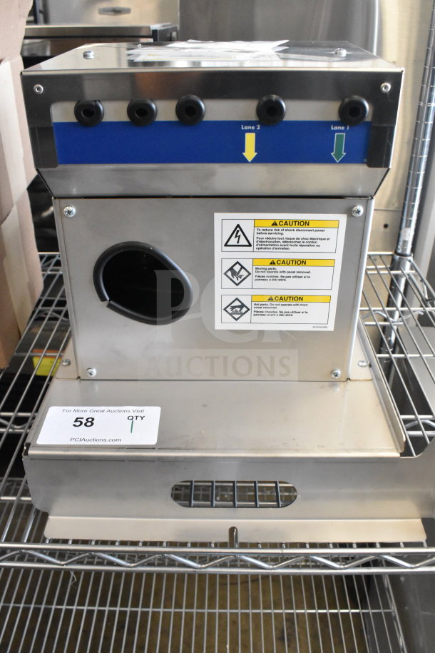 Follett IMDV-2CM Diverter Valve, stainless steel, caution labels, multiple lanes, excellent condition, serial tag included.