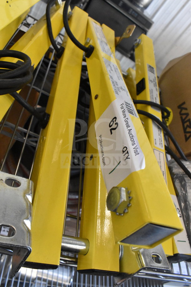 Brand new Rite Hite RH-40-P loading dock light in yellow. Minor scratches and dents. Auction tag marked "62."