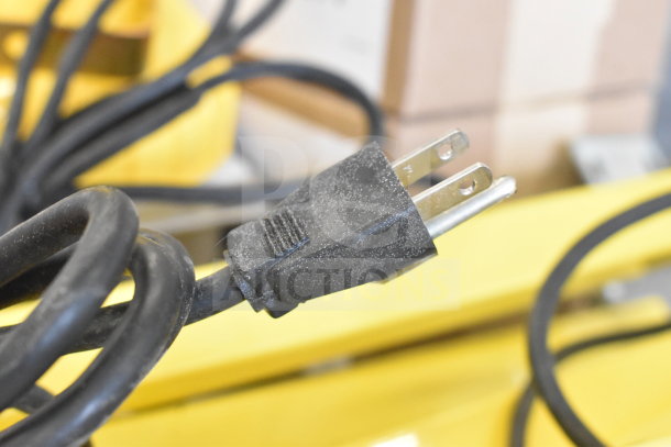 BRAND NEW Rite Hite RH-40-P loading dock light with minor scratches, showing a black power cord and plug. Ideal for docks.