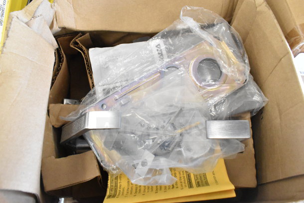Brand new Simplex LR1076S26D41 mechanical pushbutton lever set, entry/privacy lock, scratch and dent, in box.