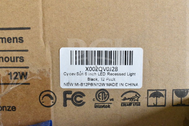 Cardboard box showing label for Cy cev Sun 6-inch LED recessed light, black, 12 pack, model MI-B12P6IN12W. Made in China.