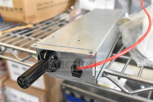Flos E347601 light fixture, metal housing, exposed wires, good condition, ideal for industrial applications.