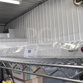 Bartco Lighting light fixture, new condition, wrapped in plastic, with auction tag "Qty 1, Lot 69" visible on packaging.