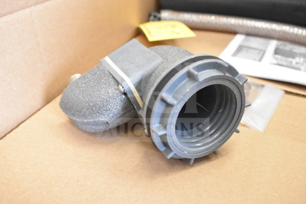 Top Mount Pedestal Kit, gray, with textured surface. Features a clamping mechanism. In new condition, no visible wear.