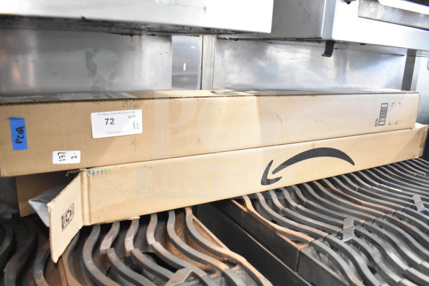 Two boxed Moen Grab Bars, model unspecified, new condition, each box labeled "QTY x2."