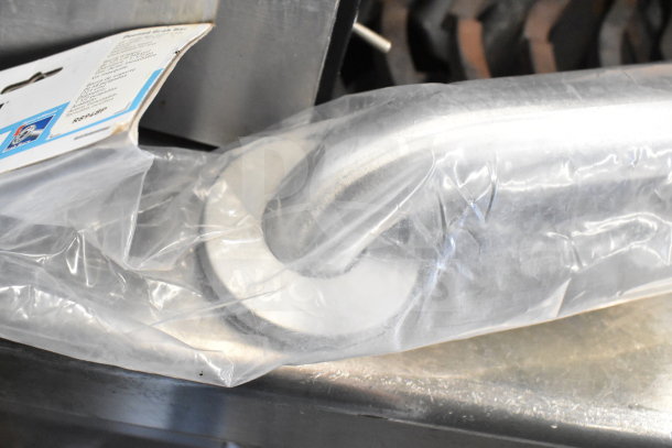 Moen grab bar in packaging with tag visible, indicating model and specifications. Item is new, stainless steel finish.