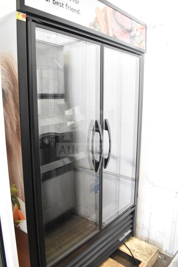 2021 True TVM-48SL-HC 2 Door Reach In Cooler Merchandiser, commercial grade, 115 volts, excellent condition.