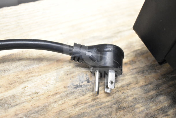 Close-up of a power plug for 2021 True TVM-48SL-HC Reach In Cooler Merchandiser, 115V, 1 Phase.