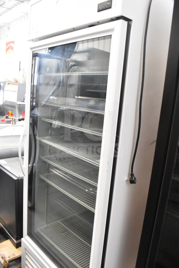 2021 True TSCI-600R-G-PH commercial reach-in cooler with glass door, adjustable shelves, 115V, 1 phase, excellent condition.