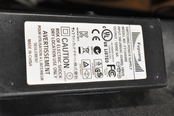 Power supply label for Nautilus StairMaster Stepmill 7000PT. Model: FY1206000. Input: 100-240VAC, Output: 12VDC. Made in China.