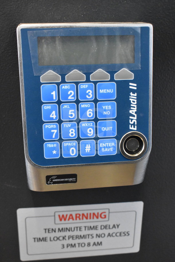 Commercial single compartment safe with ESL Audit II keypad by American Security. No combination included. Warning label details time delay.