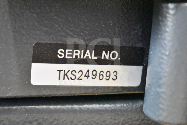 Commercial single compartment safe with visible serial number TKS249693. No combination included.