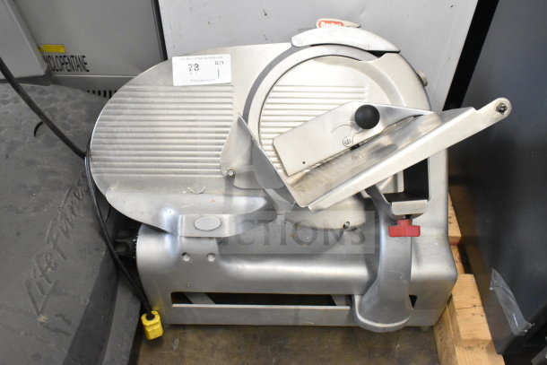 Berkel commercial countertop meat slicer with sharpening blade, 115 volts, 1 phase. Good condition with visible power cord.