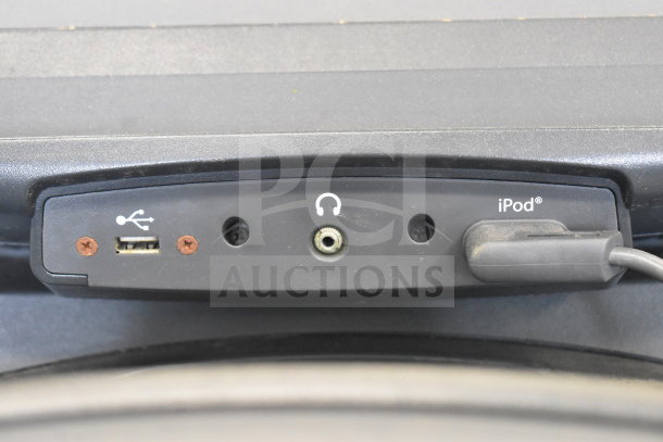 Life Fitness treadmill model ATV15-XXXA-02 with USB and headphone ports, iPod compatible. Appears in used condition.