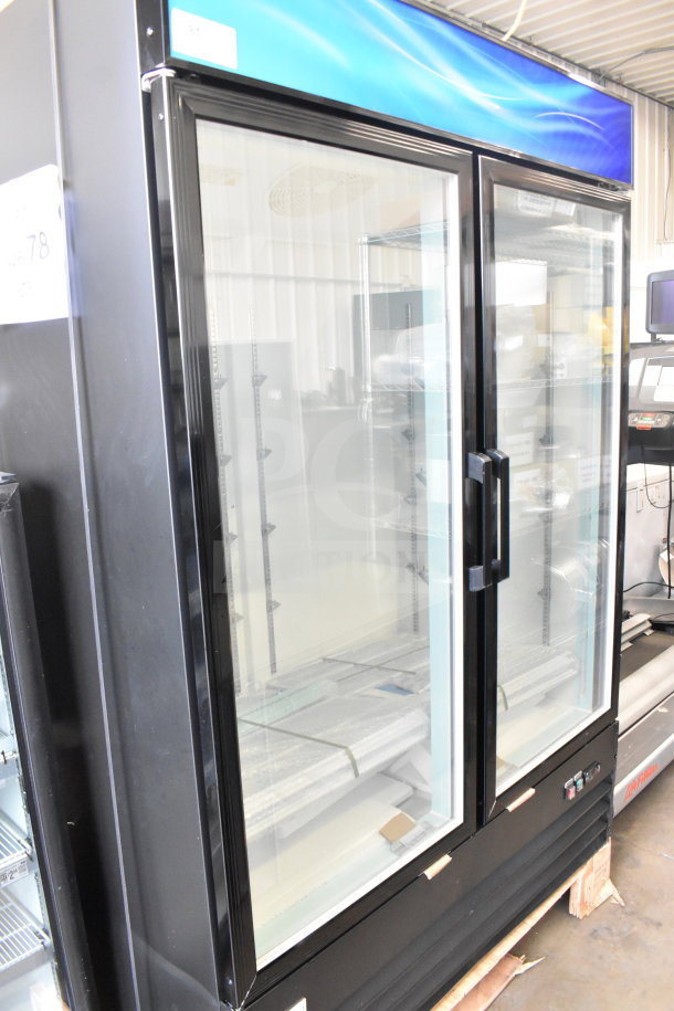 Brand new Avantco 178GDC49FHCB glass door merchandiser freezer, black, LED lighting, 115V, 1-phase, minor scratches.