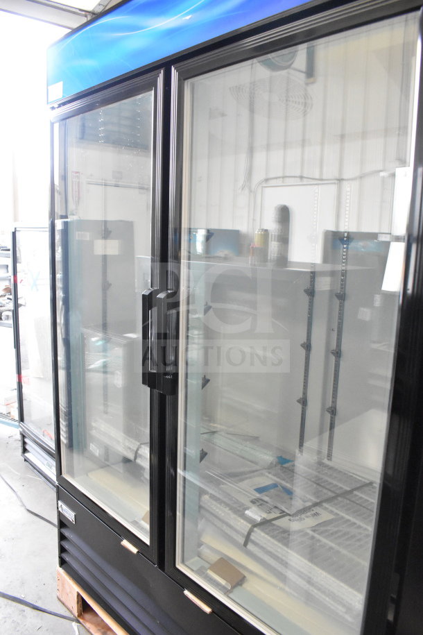 Brand new Avantco 178GDC49FHCB commercial black swing glass door merchandiser freezer with LED lighting, minor scratches.