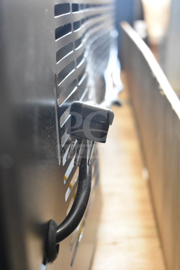 Close-up of the back of the Avantco 178GDC49FHCB freezer showing the black vent and power cord.