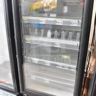 Imbera VR10 Commercial Single Door Reach In Cooler Merchandiser, 115 Volts, 1 Phase, black frame, visible tags, fair condition.
