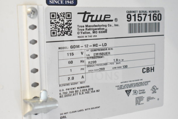 Label of 2017 True GDM-12-HC-LD commercial cooler showing model, voltage, phase, and refrigerant details. Made in USA.