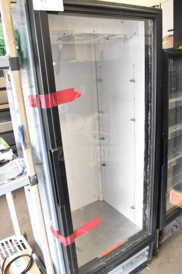 2017 True GDM-12-HC-LD single door reach-in cooler, commercial use, 115V, 1 phase, visible wear, branded panel.