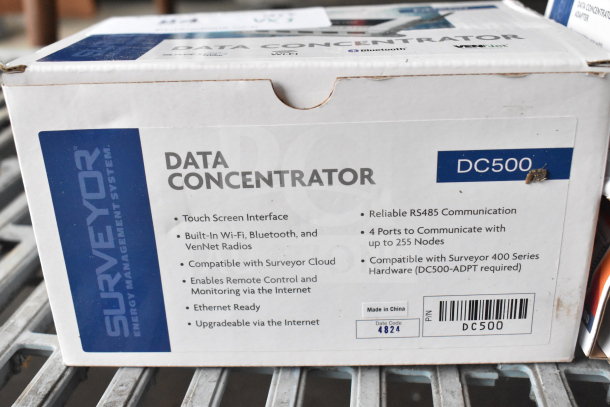 Surveyor DC500 Data Concentrator with touch screen, Wi-Fi, Bluetooth. Includes labeling for compatibility and port specs.