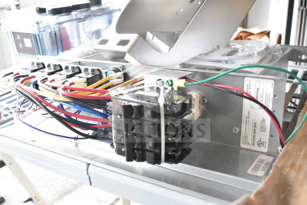 BAYEABC20BK1BAA electric heater unit with wiring and connectors. Serial numbers visible. Appears in good condition.