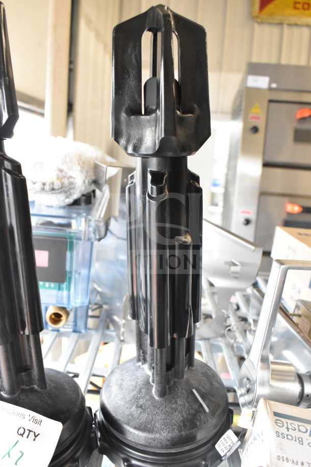 Two black industrial units with a sleek design, shown on a metal rack. Each unit appears in excellent condition.
