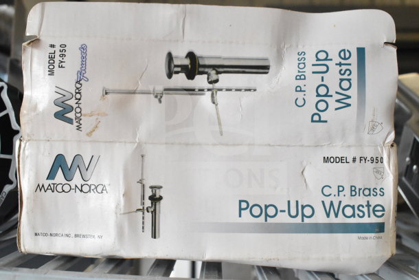 Matco Norca C.P. Brass Pop-Up Waste, Model #FY-950, in original packaging, marked "scratch and dent."