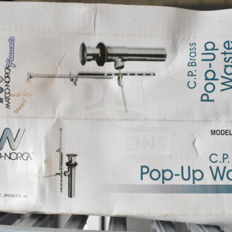 Matco Norca C.P. Brass Pop-Up Waste, Model #FY-950, in original packaging, marked "scratch and dent."
