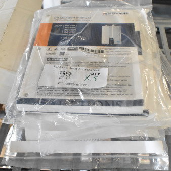 Set of 5 Navien NPE Condensing Water Heater Manuals, models NPE-180A to NPE-210S, in sealed packaging, quantity label showing “x5.”