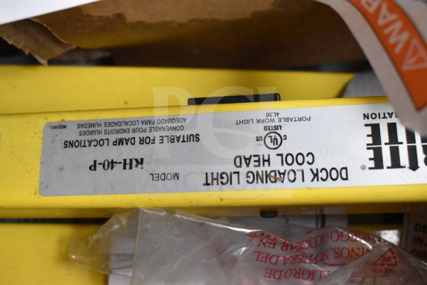 RP-H-40-P Dock Loading Light, model KH-40-P, yellow, suitable for damp locations. UL listed with condition tags visible.