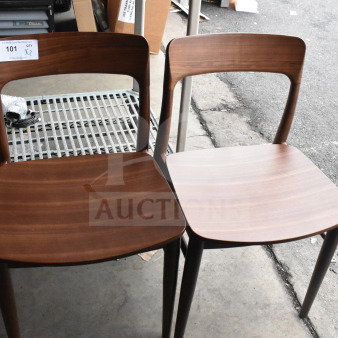 Two wooden dining height chairs with curved backs, dark finish, mild wear. Auction label reads "101 QTY X2".