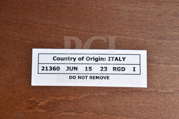 2 wooden dining chairs, made in Italy. Features a label with origin details. Excellent condition.