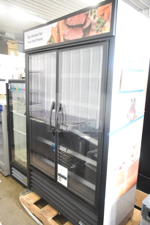 2021 True TVM-48SL-HC commercial 2-door reach-in cooler. Features glass doors, internal shelving, 115V, 1 phase.
