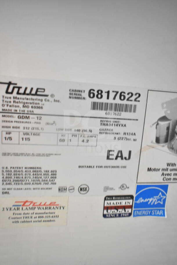True GDM-12 cooler label showing model, serial number 6817622, 115 volts, 1 phase, Energy Star, Made in USA.