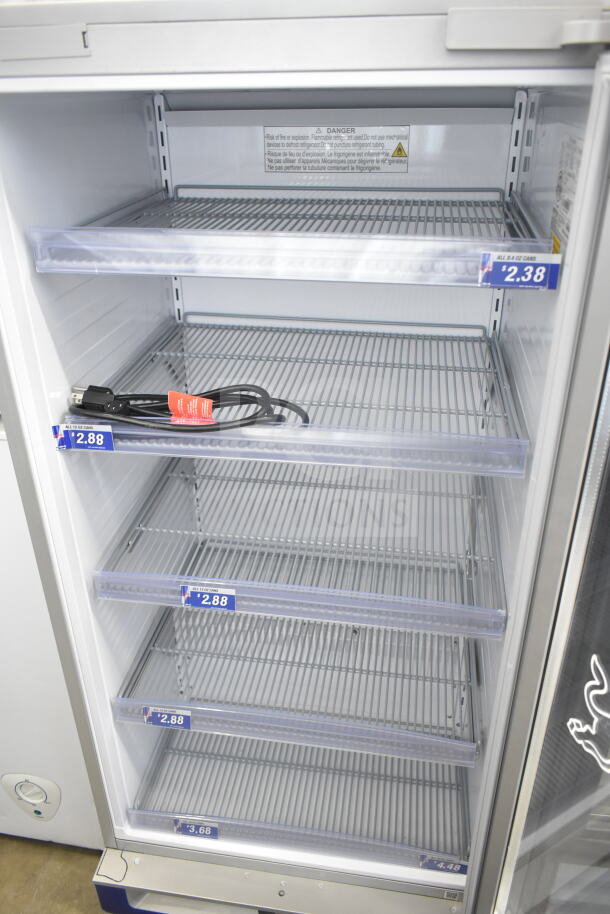 GDC RB-GDC Eco LED single door mini cooler merchandiser, 115V, 1 Phase, with wire shelves, price labels attached.