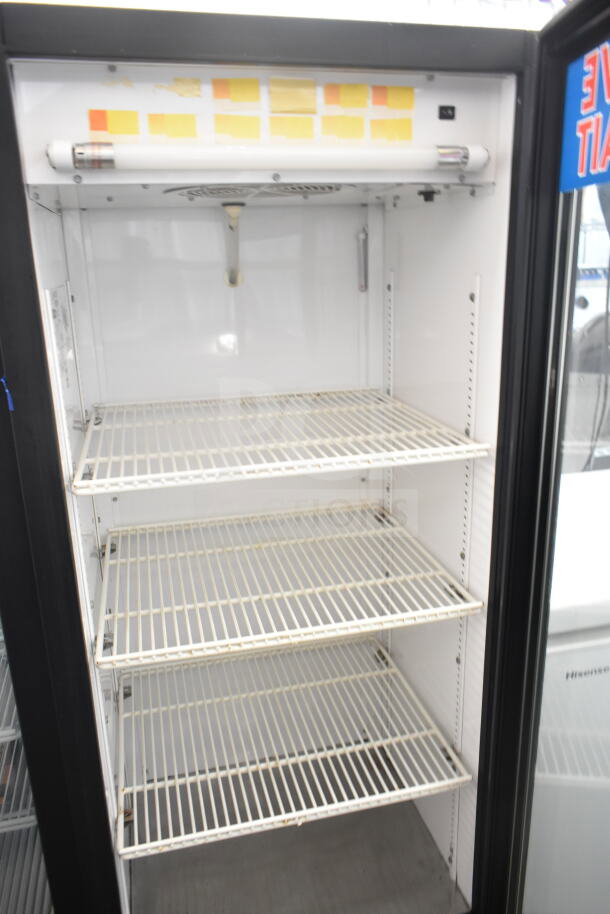 True GDM-12 commercial single door cooler merchandiser, 115 volts, 1 phase, four shelves, used condition.