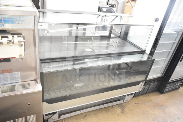 Structural Concepts NR6051RRSV.8106 deli display case, glass front, commercial use, 120V, good condition.