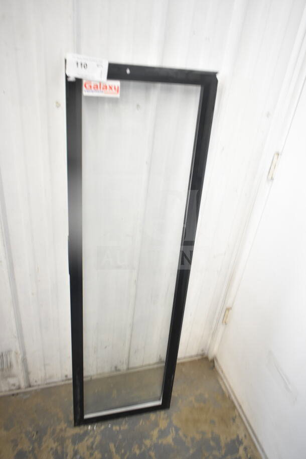 Galaxy Door for Merchandiser, clear glass panel, black metal frame, excellent condition, features brand label.