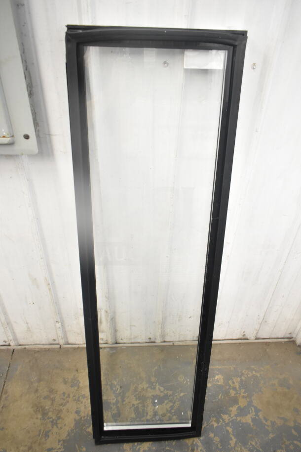 Glass door with black frame for Galaxy merchandiser, in good condition. Suitable for commercial refrigeration units.
