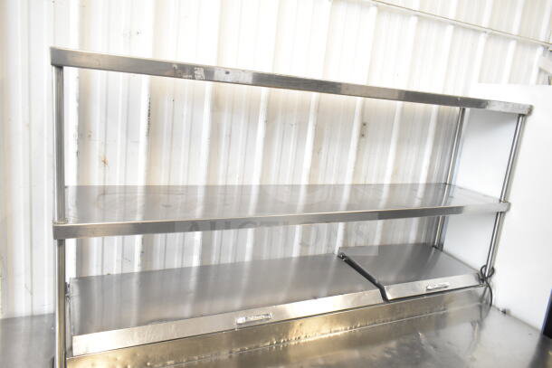 True TPP-67D-4 pizza prep table with 4 drawers, 2-tier over-shelf, and commercial casters. Stainless steel, 115V, 1 phase.