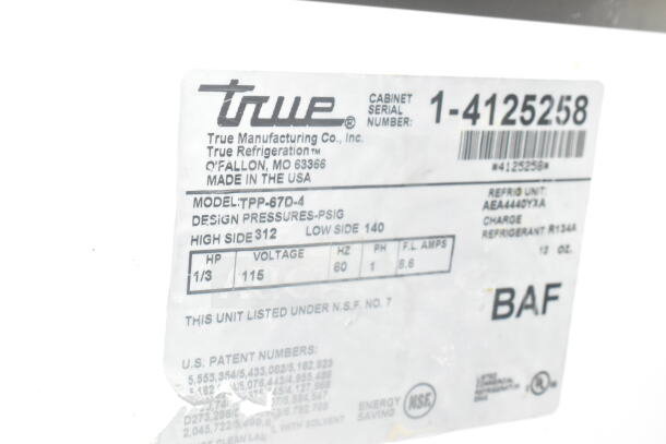 True TPP-67D-4 commercial pizza prep table label showing model, voltage, and NSF certification.