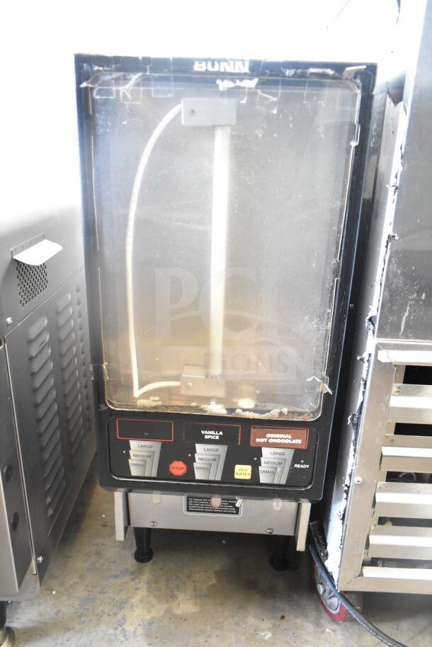 Bunn FMD DBC-3 countertop cappuccino machine, 120/240V, 1 Phase, visible dispensing buttons, fair condition.
