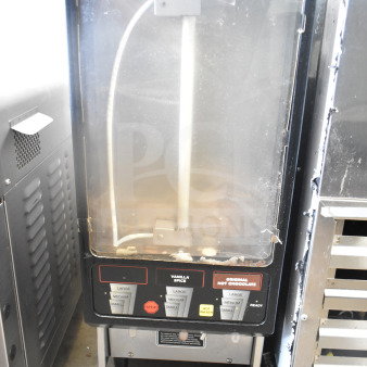 Bunn FMD DBC-3 countertop cappuccino machine, 120/240V, 1 Phase, visible dispensing buttons, fair condition.